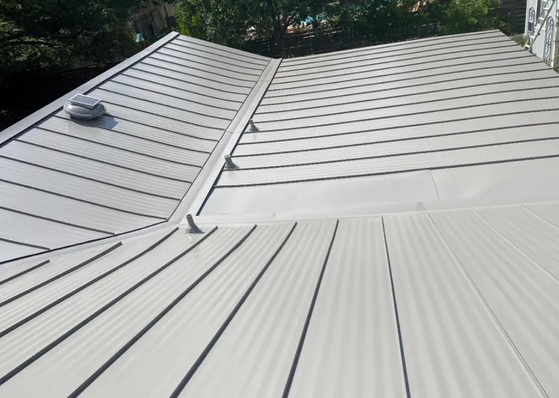 Solar attic fan installed on a metal roof for Roof Ventilation in Mountain Park